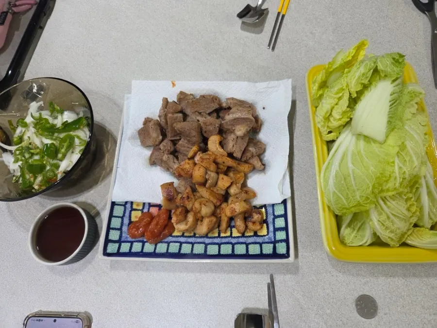 Grilled makchang and gopchang served with pork neck