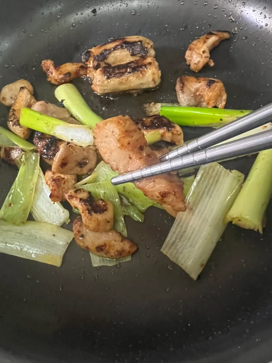 Seasoned large intestine with a crisp torch-grilled surface