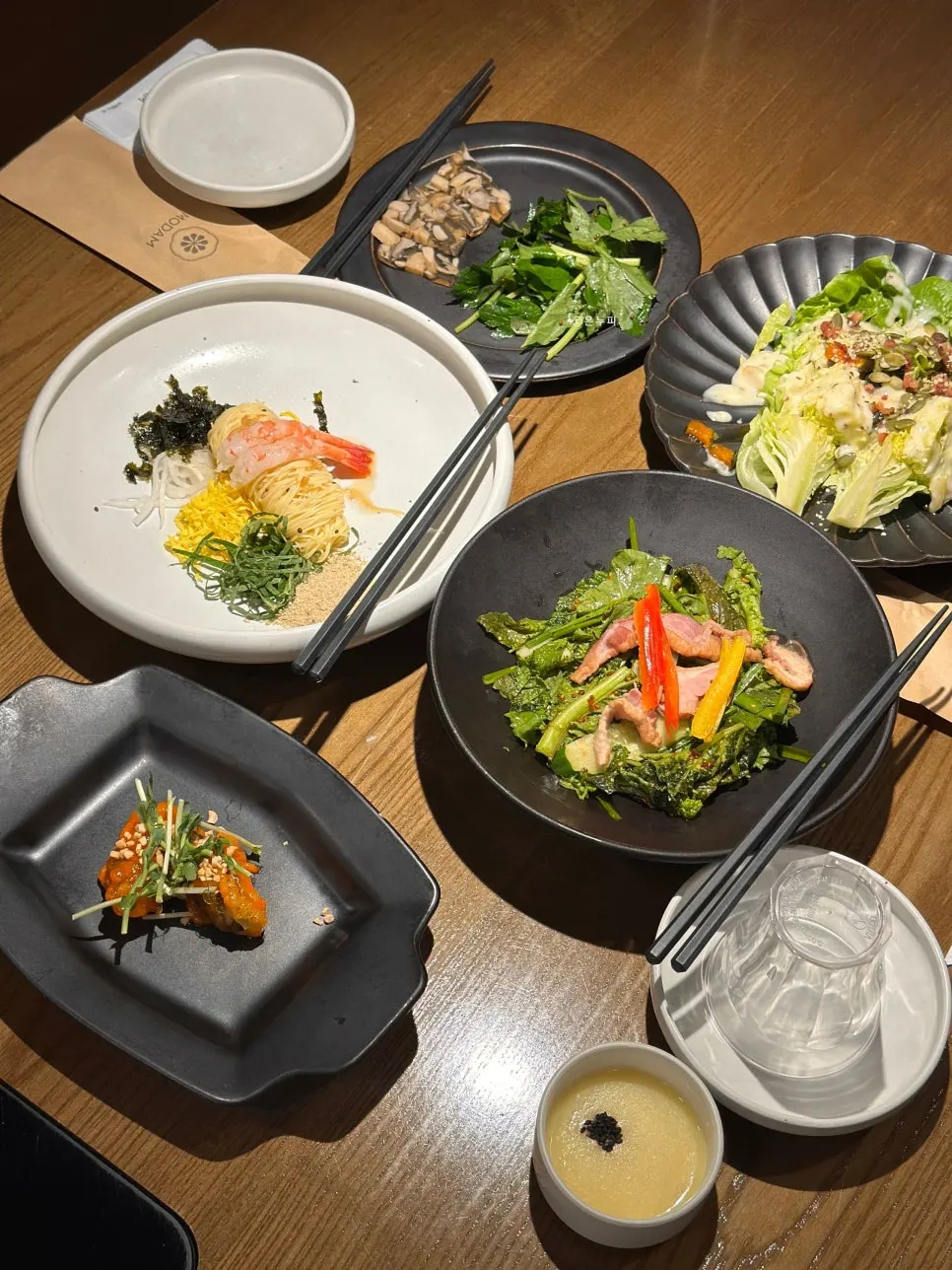 Table spread of the dishes ordered for two at Modam Urban