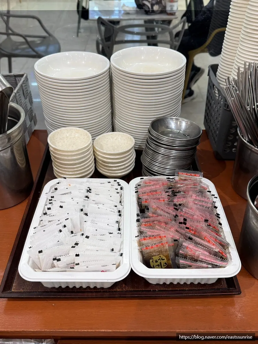 Self-serve station with pickled radish, salt, and soy sauce