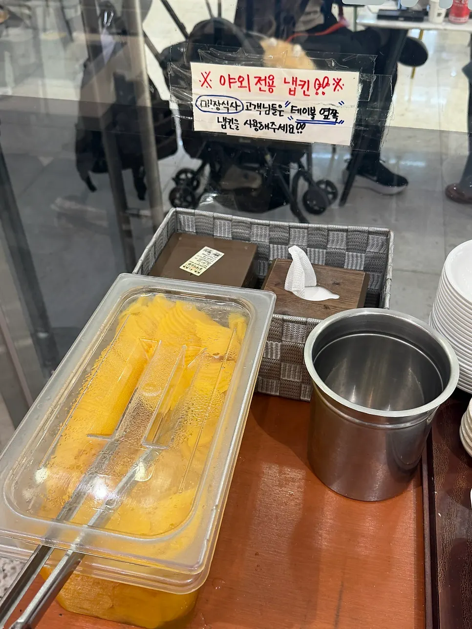 Outdoor-only napkins and self-serve bar