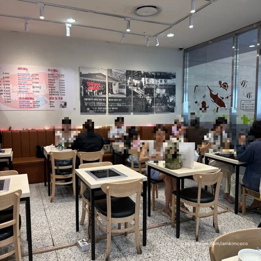 Indoor table seating at Hyeonseonine Premium IFC Mall Branch