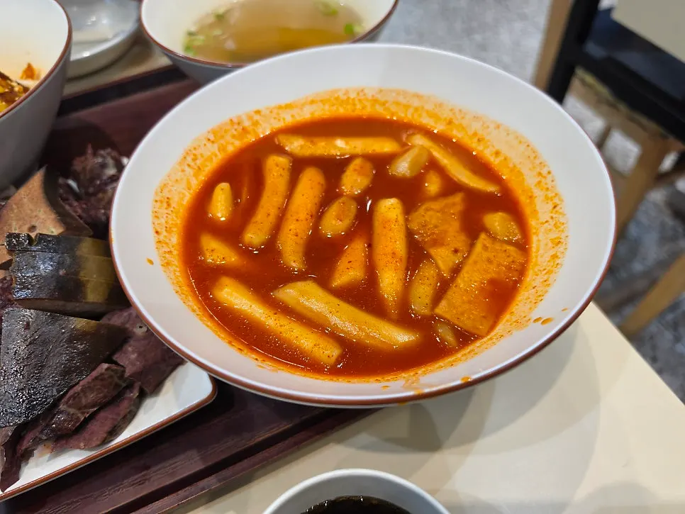 Medium-spice tteokbokki from Hyeonseonine with generous broth