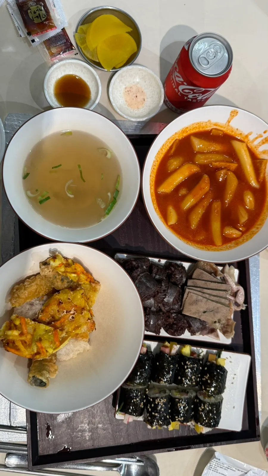 Hyeonseonine set with tteokbokki, sundae, fried snacks, and gimbap