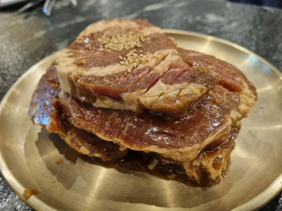 Marinated meat with accompanying side dishes