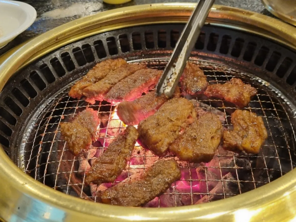 A tender, well-grilled piece of marinated pork rib