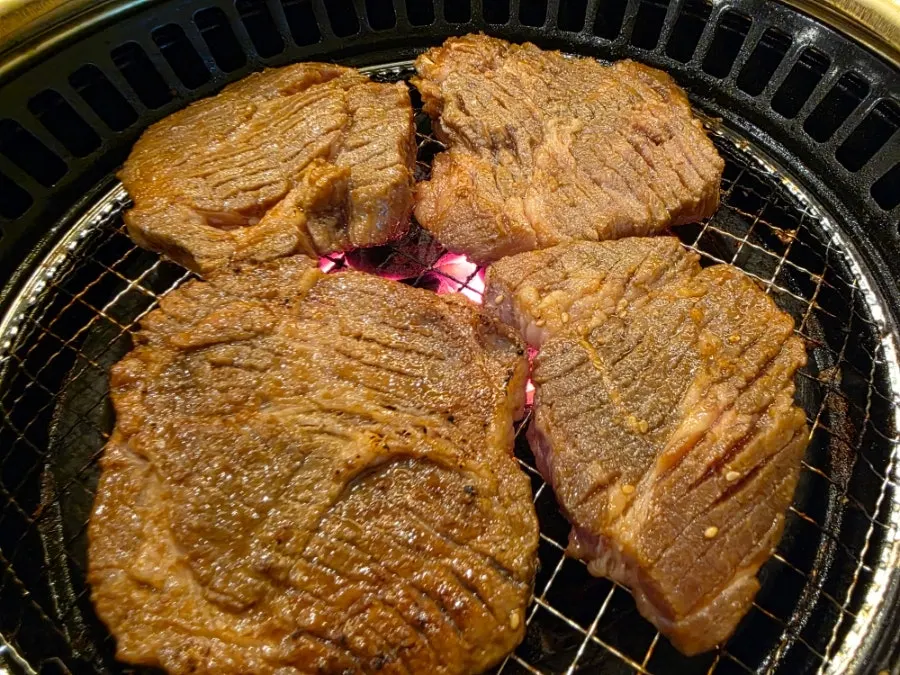 Meat spread served with scallion salad and basic side dishes
