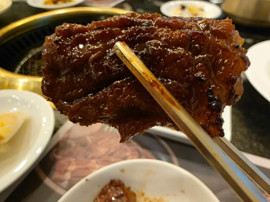 A well-grilled piece of pork galbi
