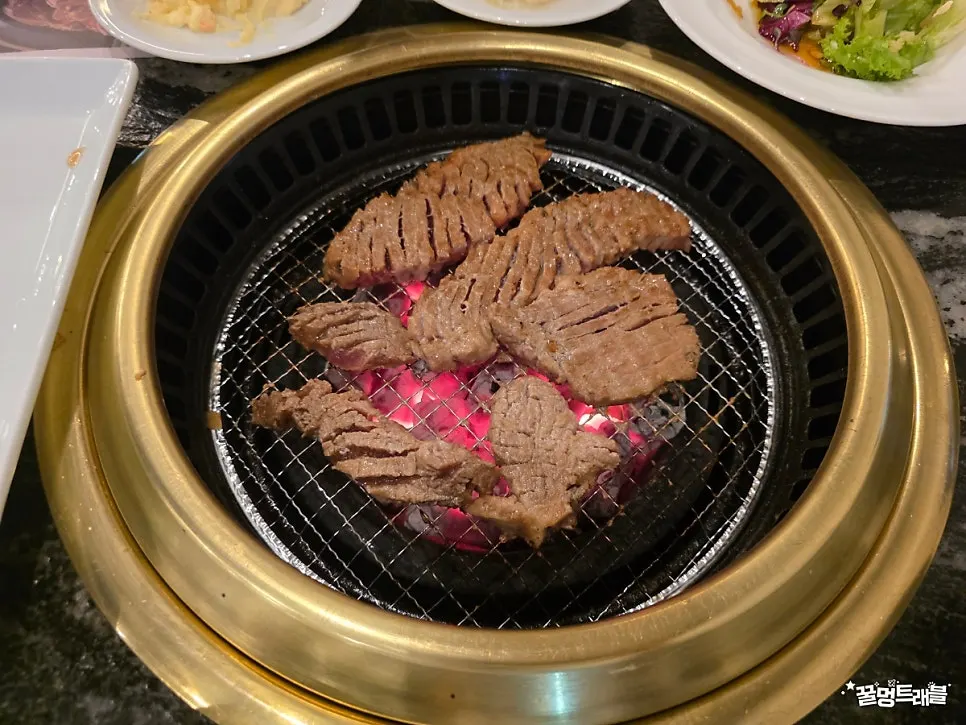 Marinated pork ribs placed over the charcoal
