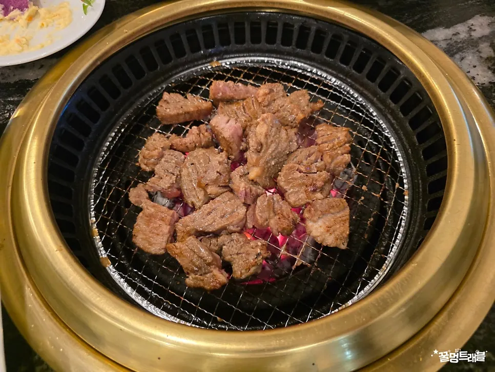 Staff grilling the marinated ribs directly