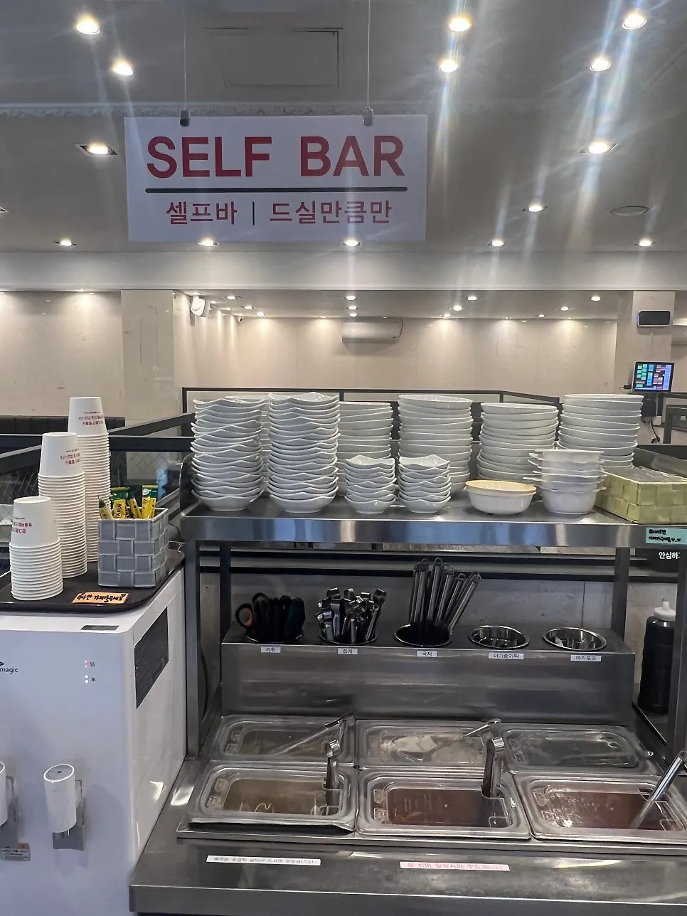 Menu board with spice level guide at Jjamppong Jijeon Seooreung Branch