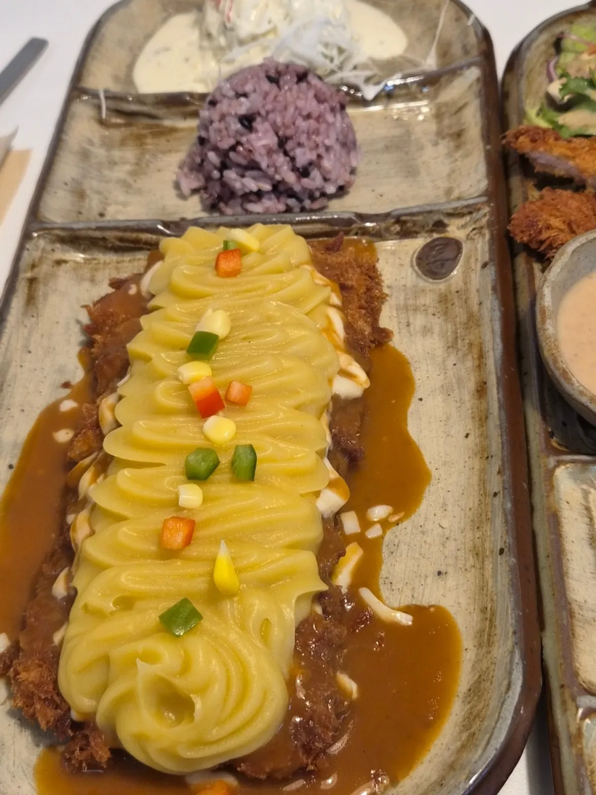 A full spread of the sweet potato cheese pork cutlet at Ikki Roll Katsu