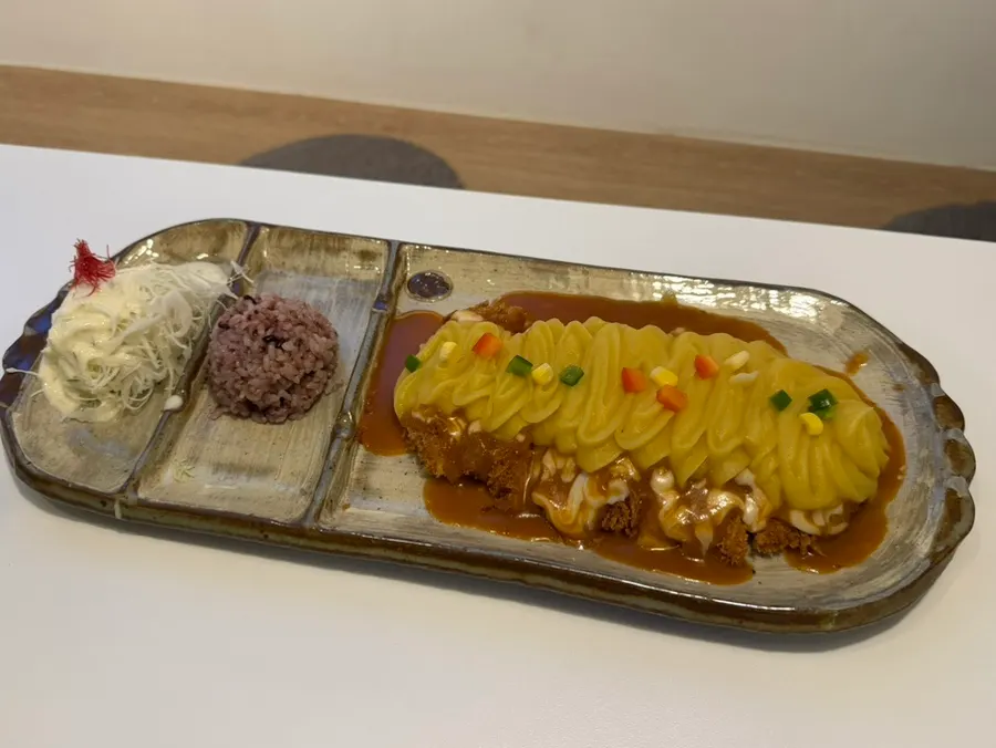 A plate of sweet potato cheese katsu from Couple Set B