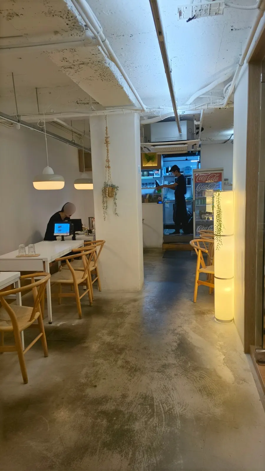Interior view of Ikki Roll Katsu with tables set up