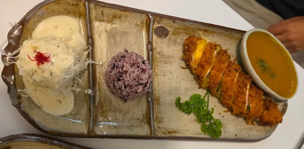 Curry cheese pork cutlet served with curry sauce