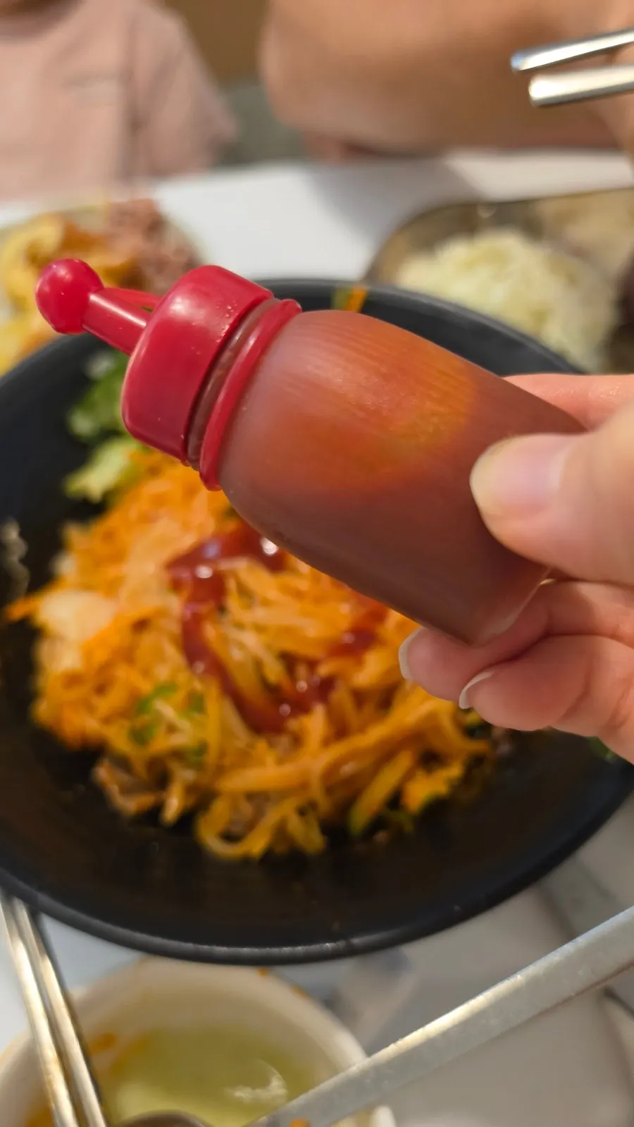 Sauce containers on the table