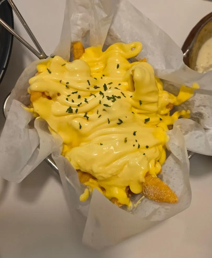 Butter garlic fries topped generously with garlic sauce