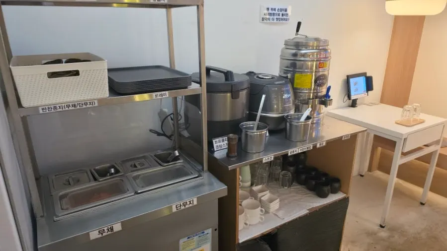 Self-serve bar with soup and broth ready to go