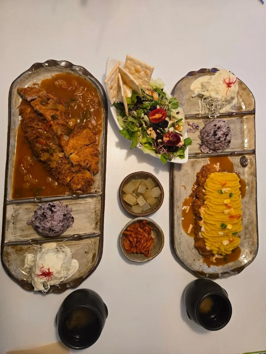 Sweet potato cheese pork cutlet and regular pork cutlet served on large plates