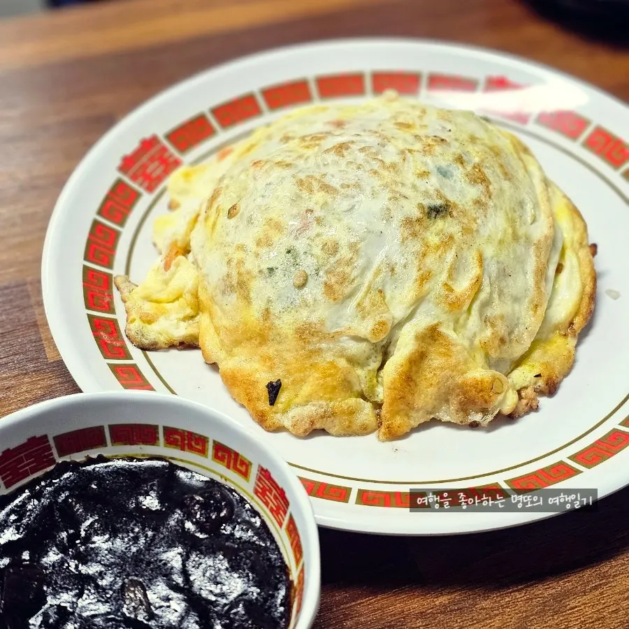 Meat jjamppong and fried rice on the table