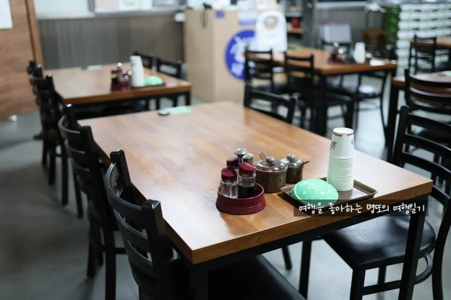 Soy sauce, vinegar, and chili powder on the table