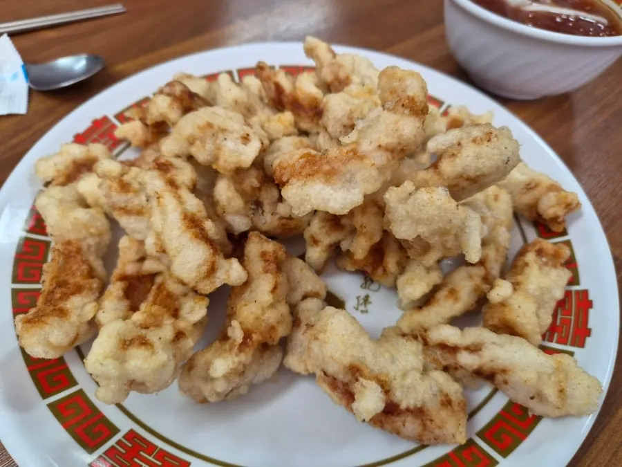Full spread of dishes served on the table at Hwangbihong