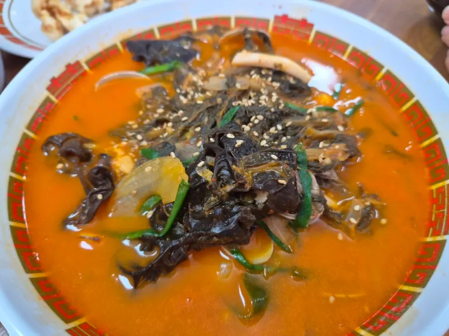 Jjamppong and fried rice served together on the table