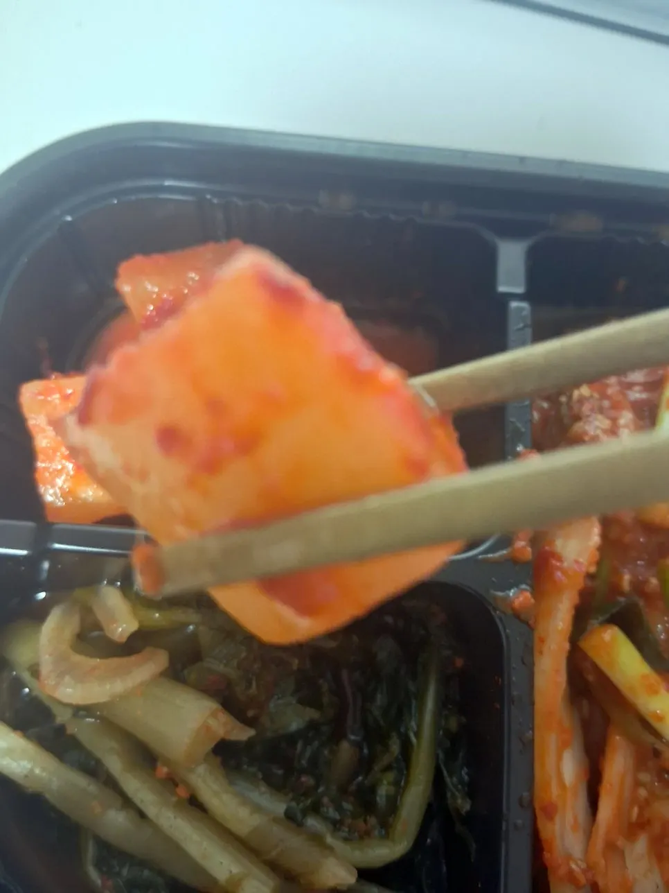 Takeout side dishes and seasonings arranged together