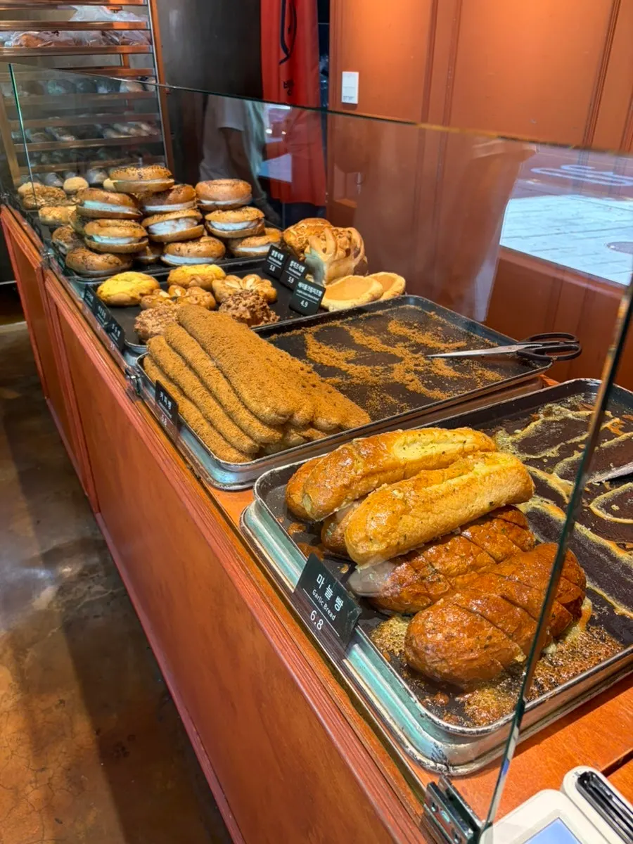 Certifications and notices posted at Munhwa Bakery's entrance