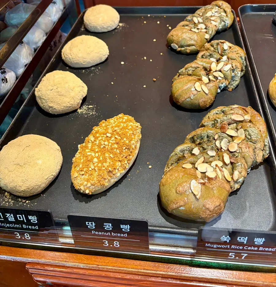 Bread display shelves inside Munhwa Bakery