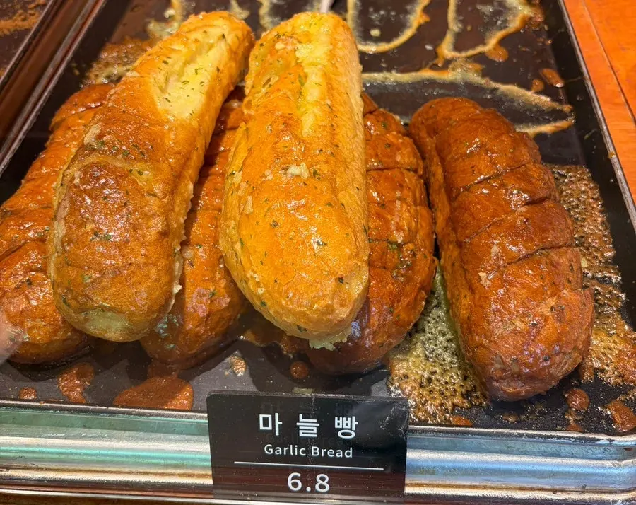Wide shot of the bread display at Munhwa Bakery
