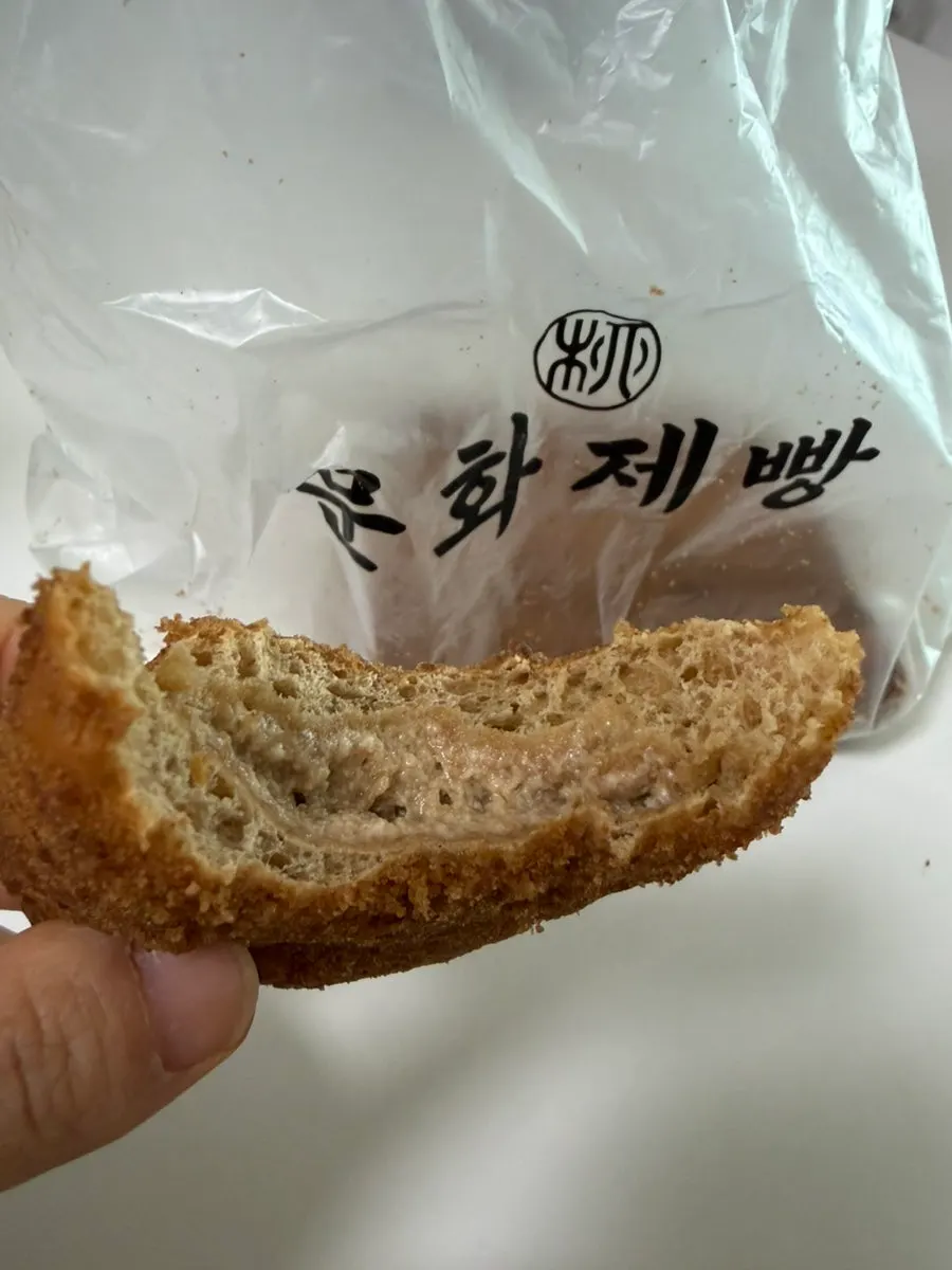 Unwrapping the coffee bread from Munhwa Bakery