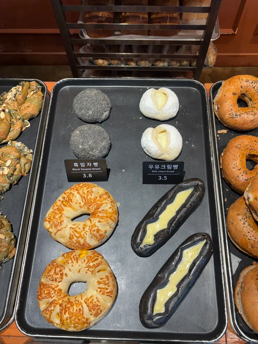 Assorted bread varieties on display at Munhwa Bakery