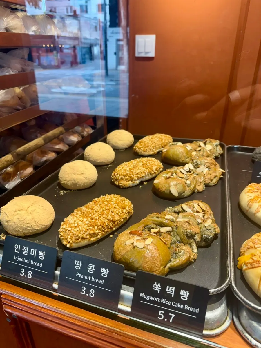 Mugwort rice cake bread displayed at Munhwa Bakery