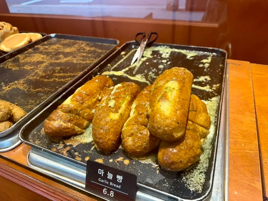 Horizontal shot of Munhwa Bakery's garlic baguette