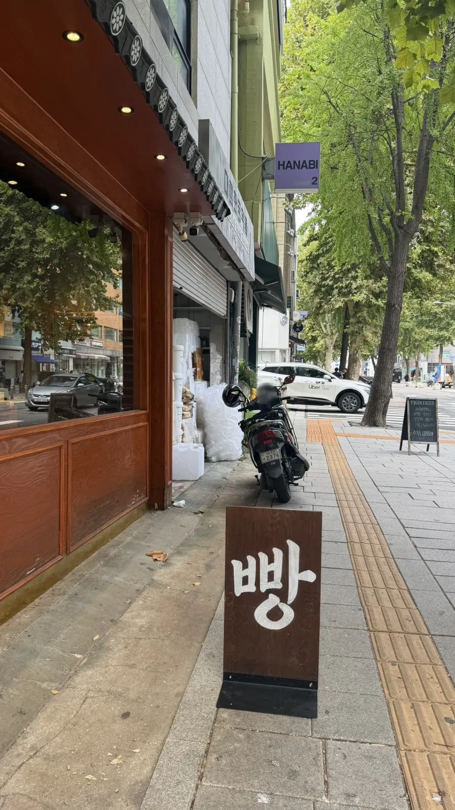 Takeout bag of garlic bread from Munhwa Bakery in Ikseon-dong