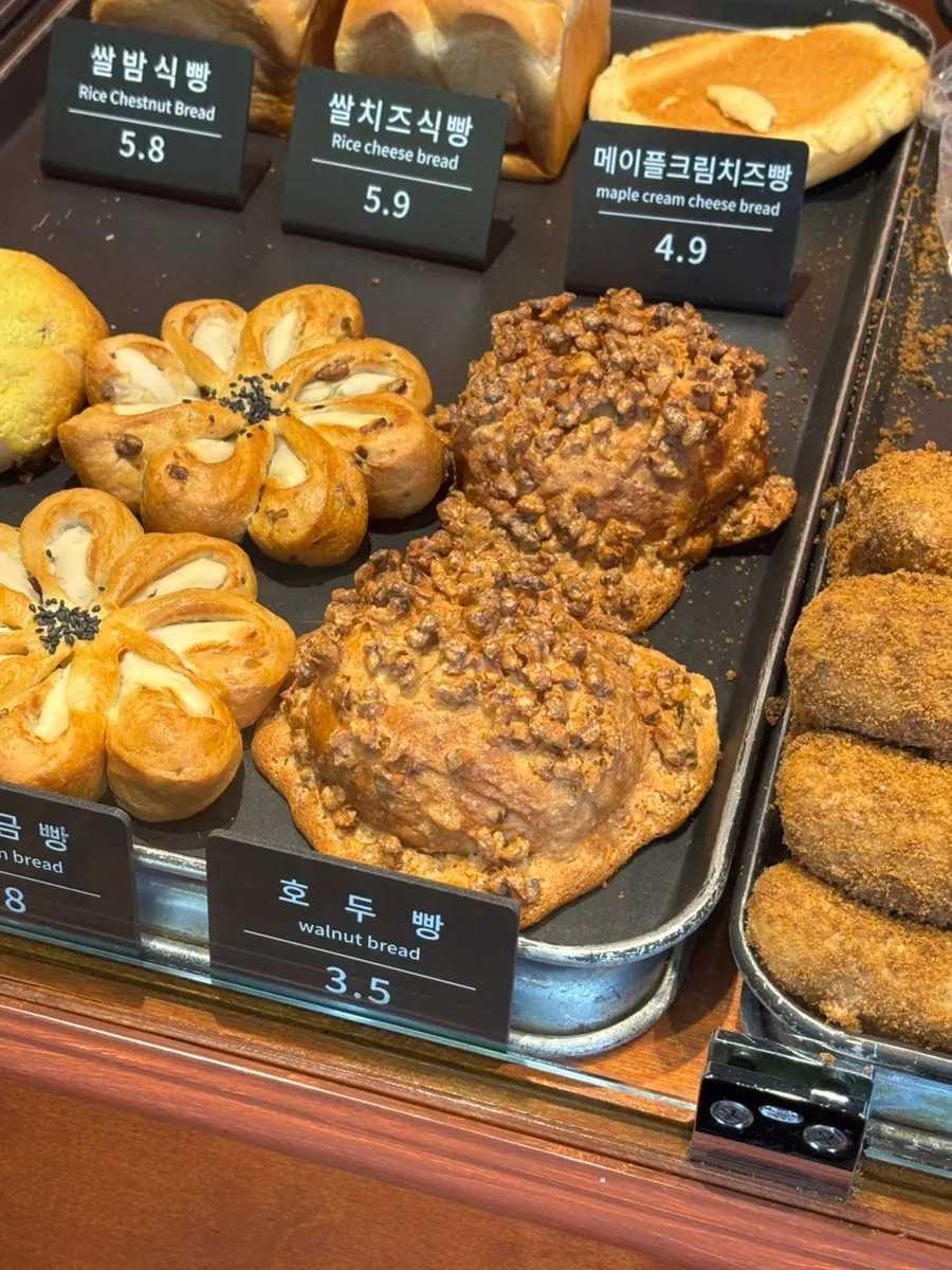 Sweet potato bread and white bean paste bread on display