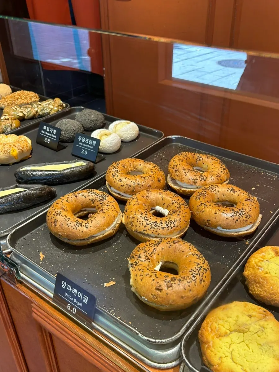 Rice chestnut loaf, rice cheese loaf and other breads on display