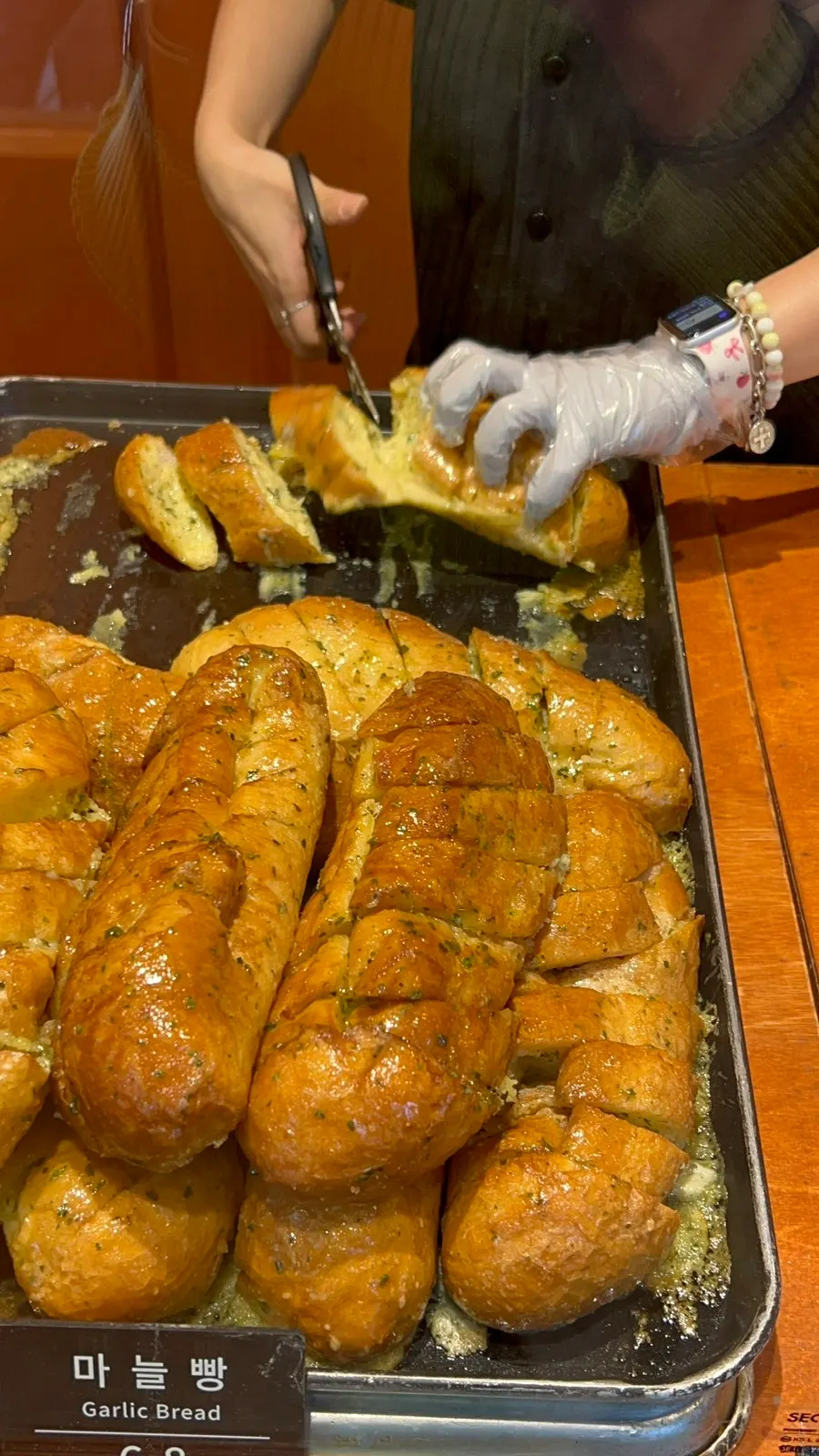 Munhwa Bakery's garlic bread covered in sauce