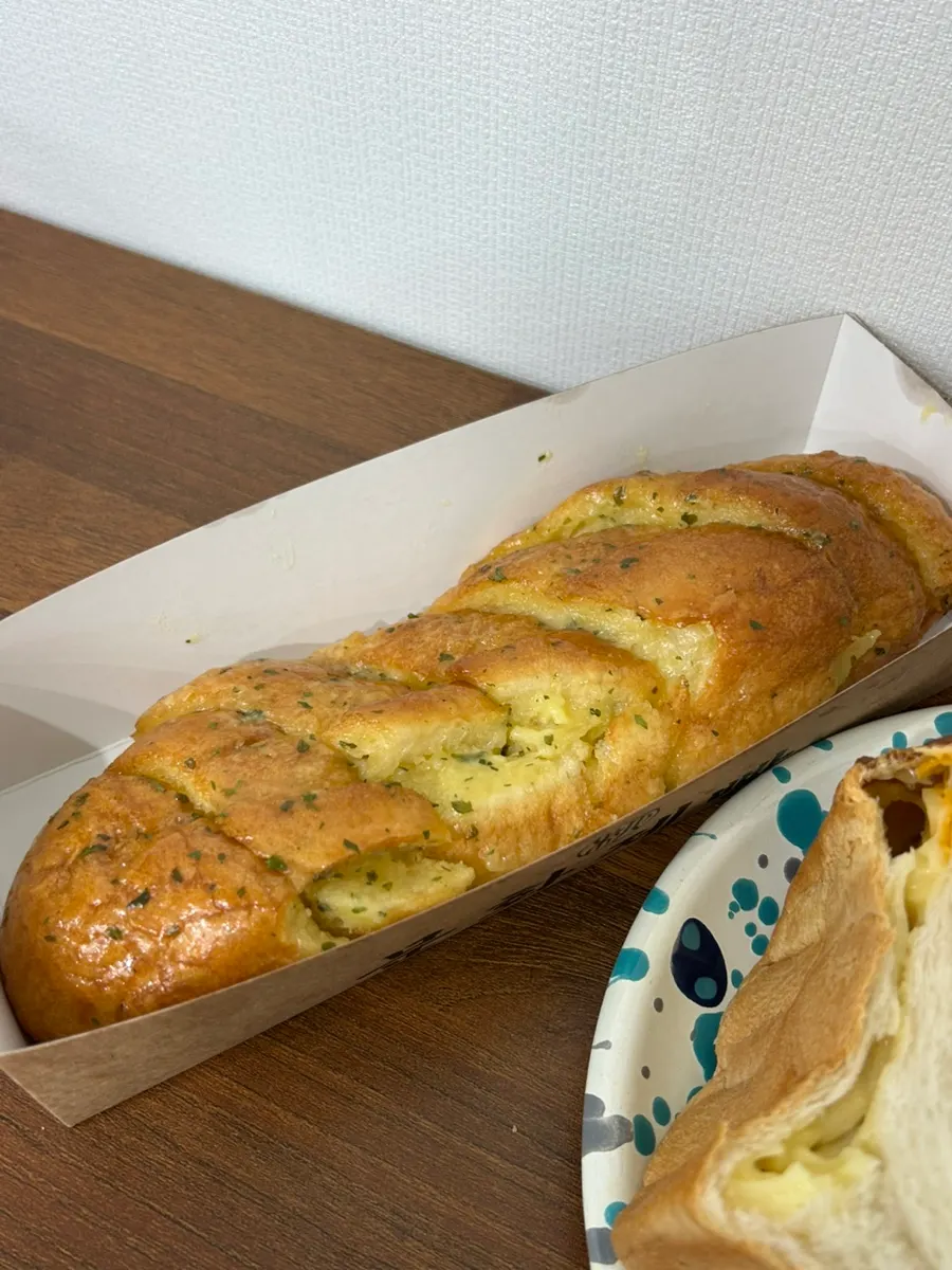 A moist piece of garlic bread