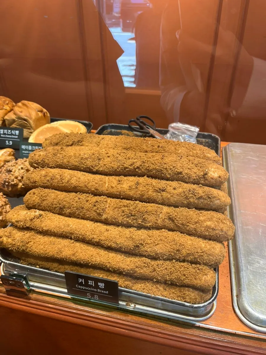 Bread display case at Munhwa Bakery