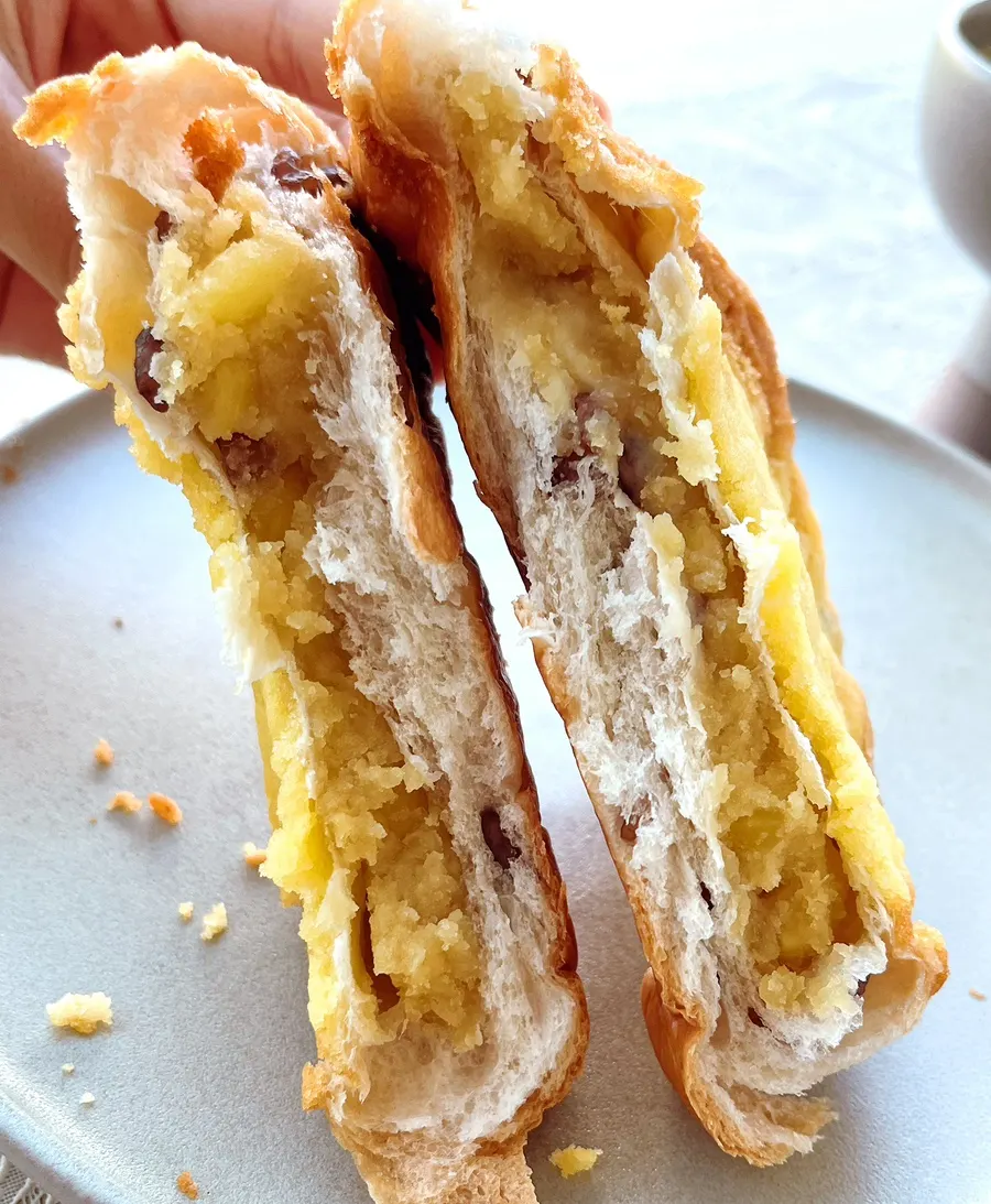 A bite taken out of Munhwa Bakery's sweet potato bread