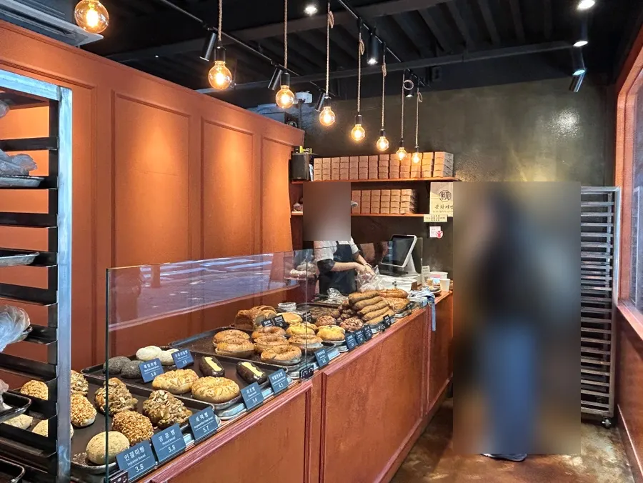 Varied bread display at Munhwa Bakery