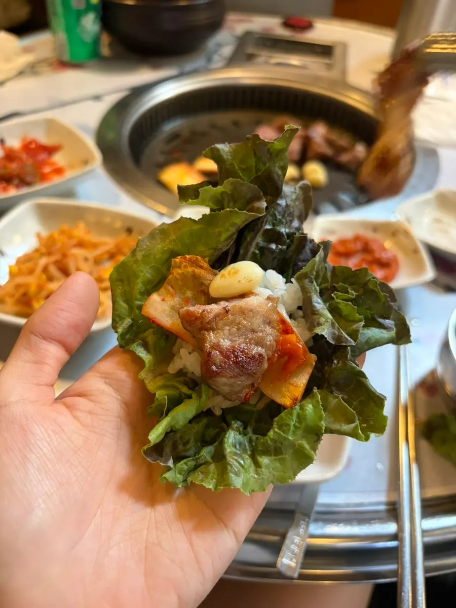 Table spread with grilled pork at Meongseokjip
