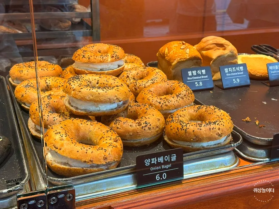 Overall view of the bread display case at Munhwa Bakery