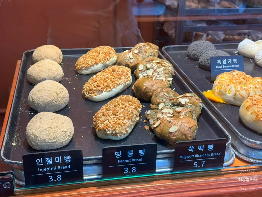 Menu board and bread varieties at Munhwa Bakery