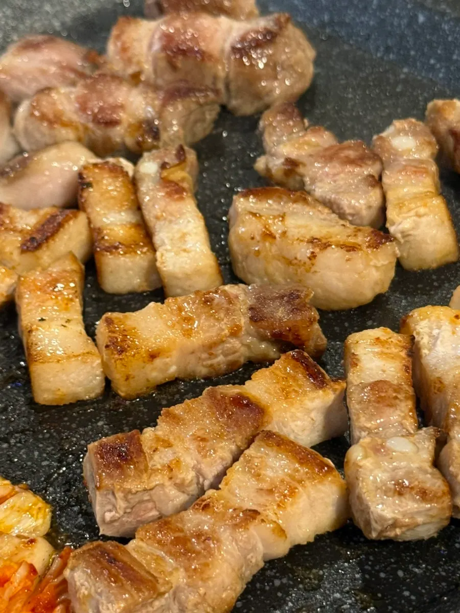 A perfectly browned piece of grilled pork belly