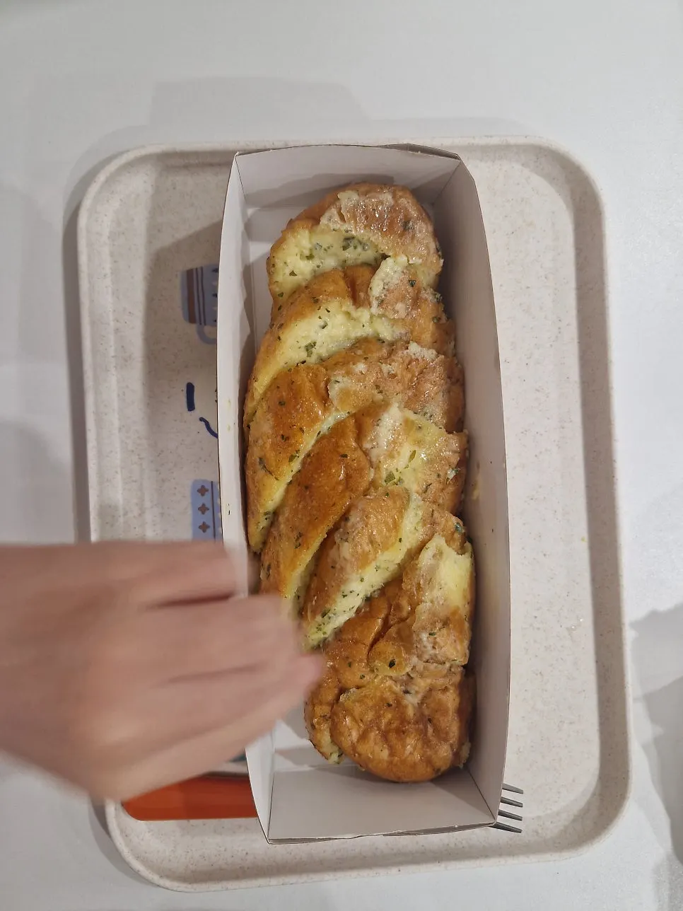 Wrapping up bread takeaway in Ikseon-dong