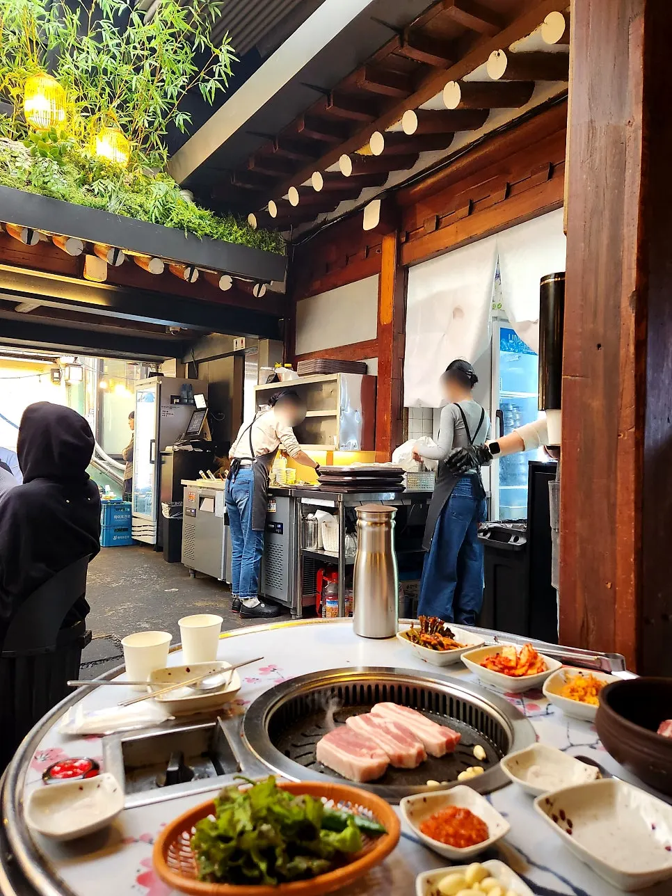 Inner seating at Meongseokjip with an outdoor-patio mood