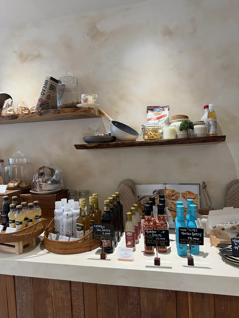 Café space stocked with European groceries